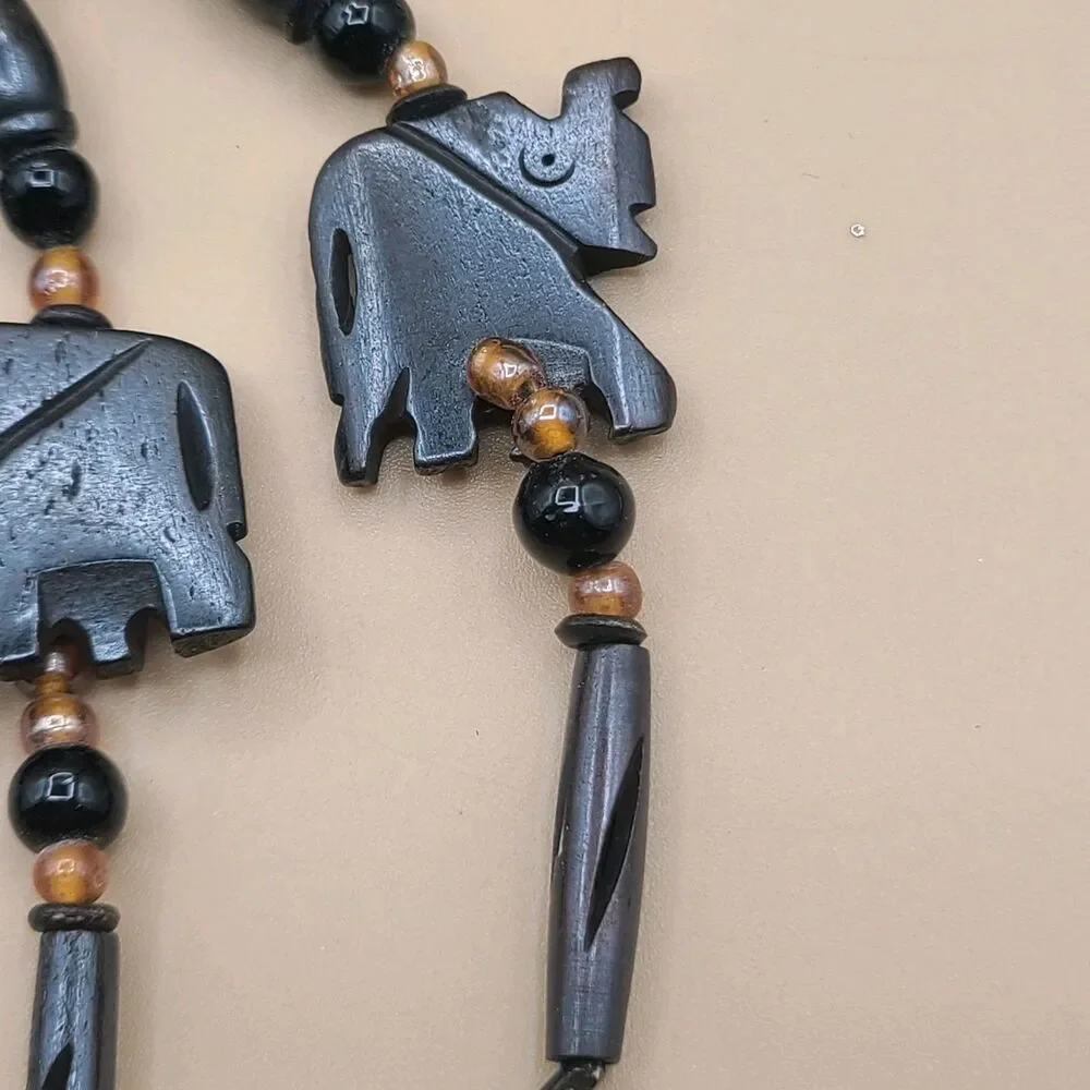 Vtg Pier 1 Imports Hand Carved Wood Beaded Elephant Napkin Rings Set of 7